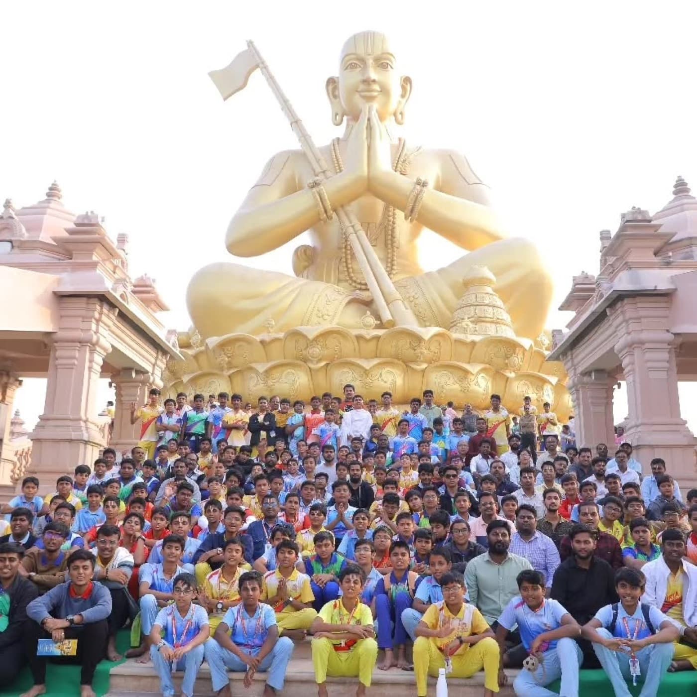 The golden 216-foot murti of Bhagavad Sri Ramanujacharya in a seated Anjali pose